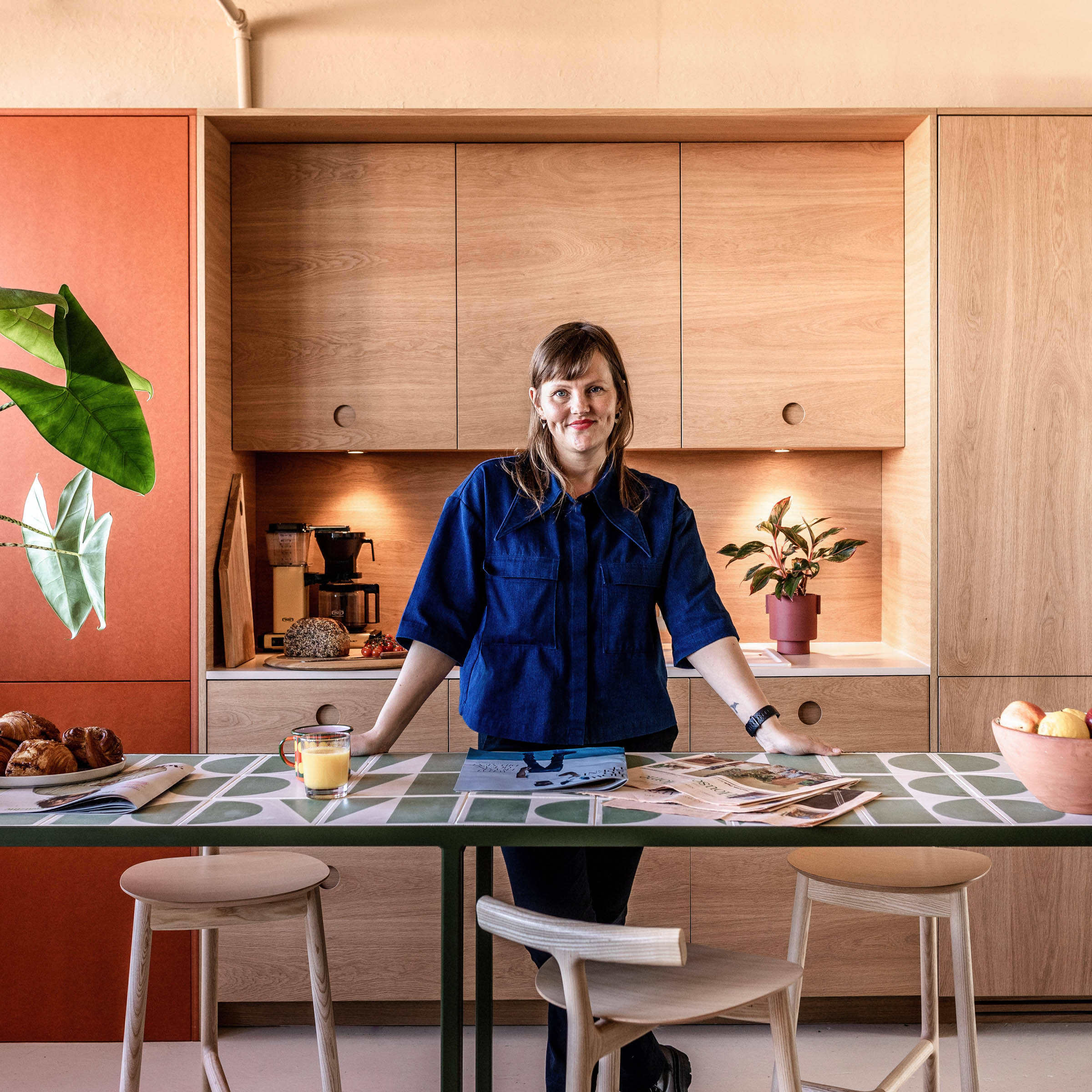 Person in front of kitchen table
