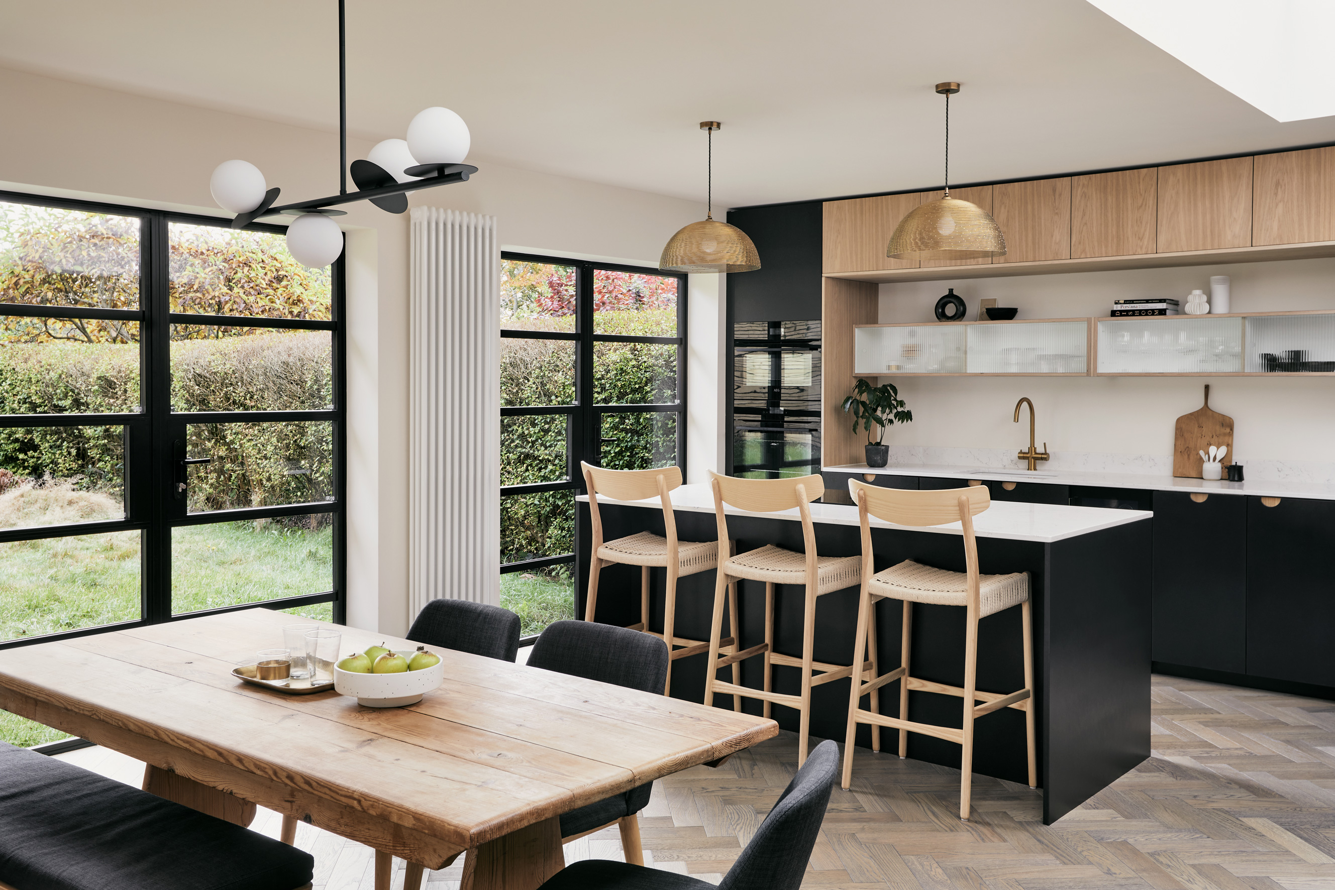 Kitchen with seating island and table