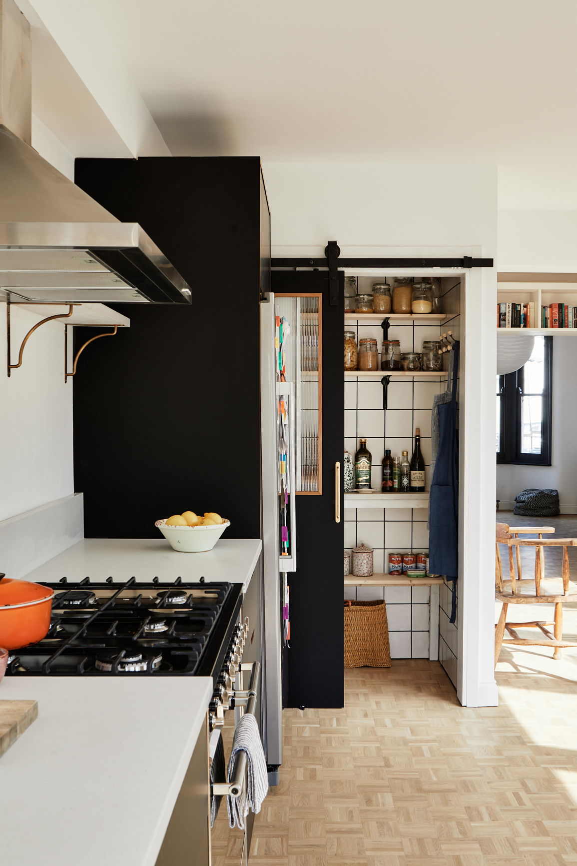 BLACK KITCHEN WITH OPEN LARDER DOOR