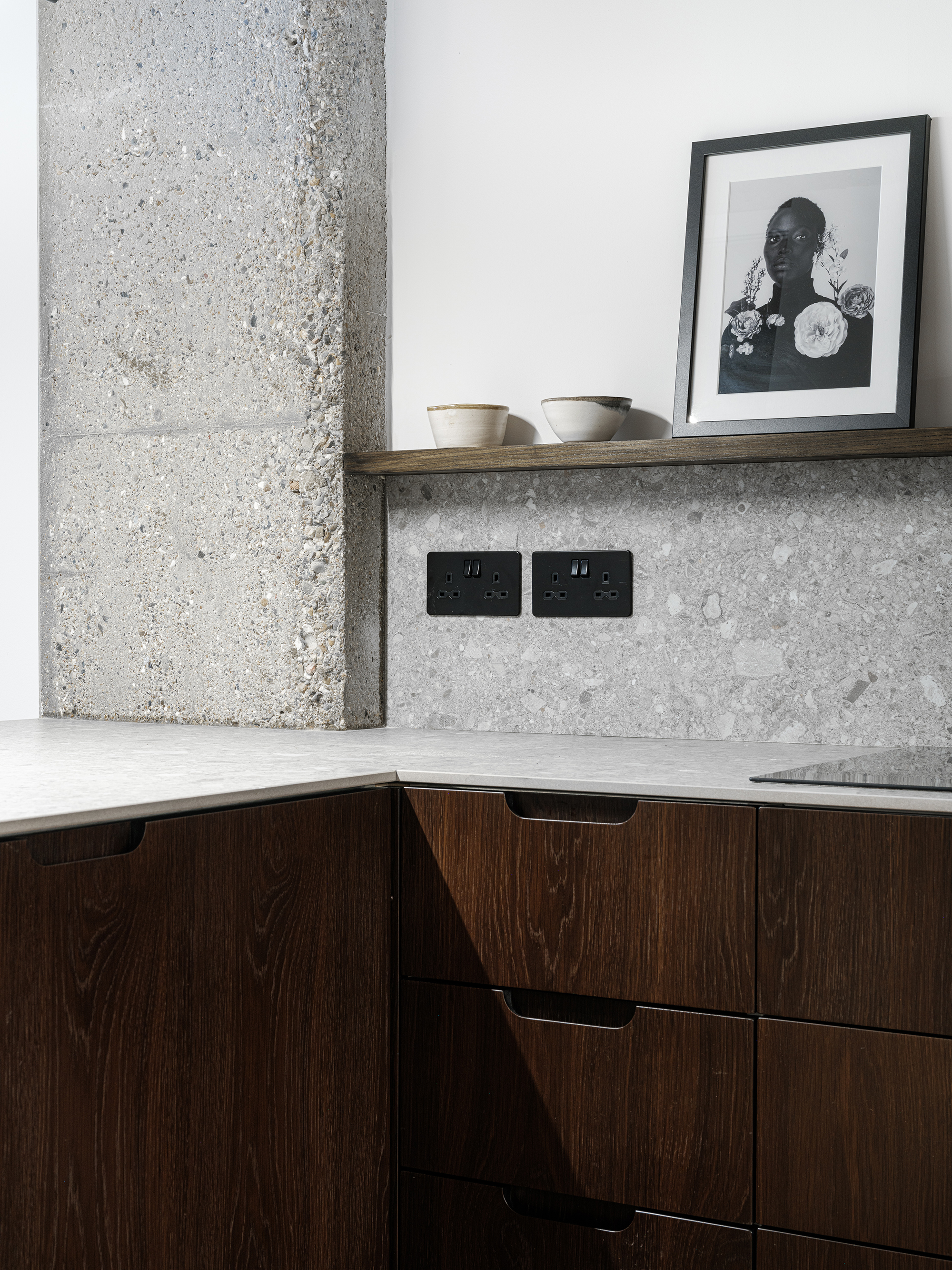 wooden cabinets and concrete worktop