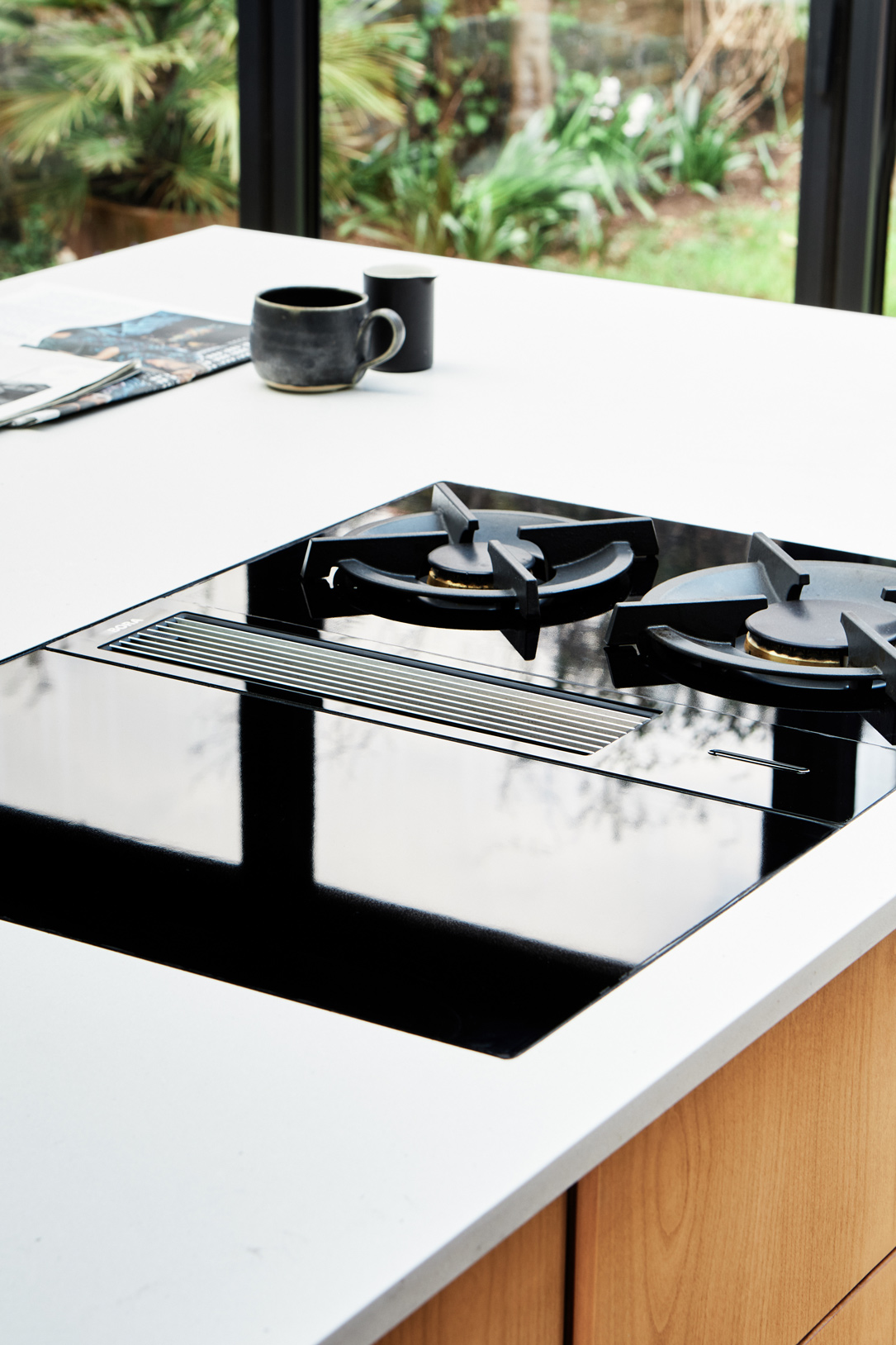 black bora hob on white worktop