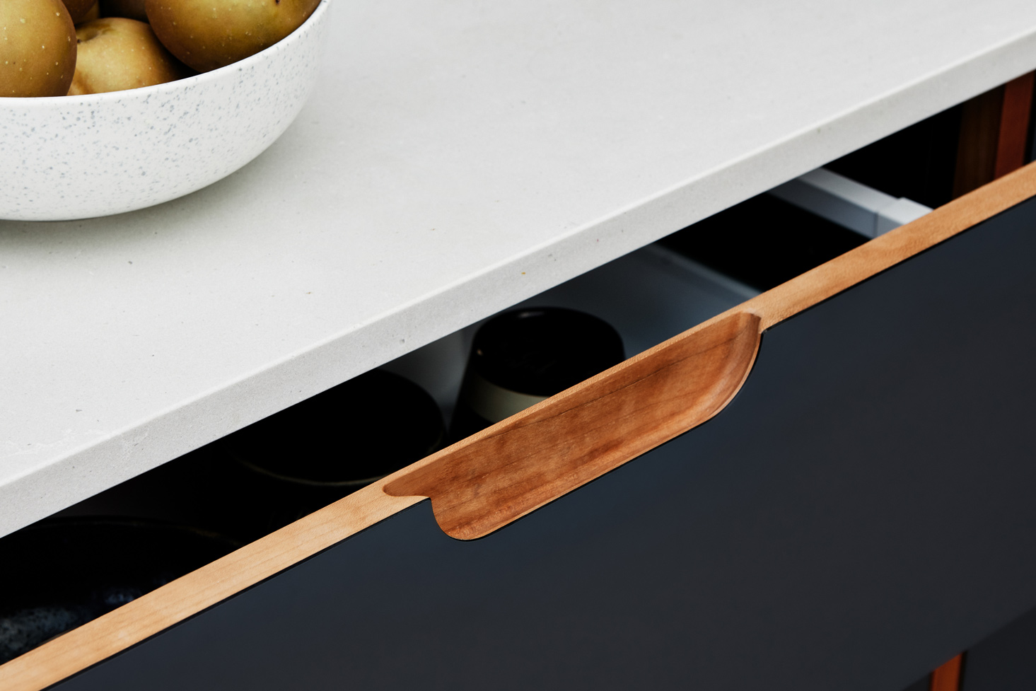 open kitchen drawer under white worktop