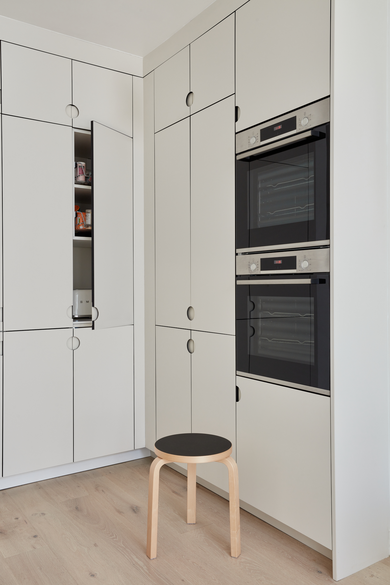 white kitchen counter and cupboards