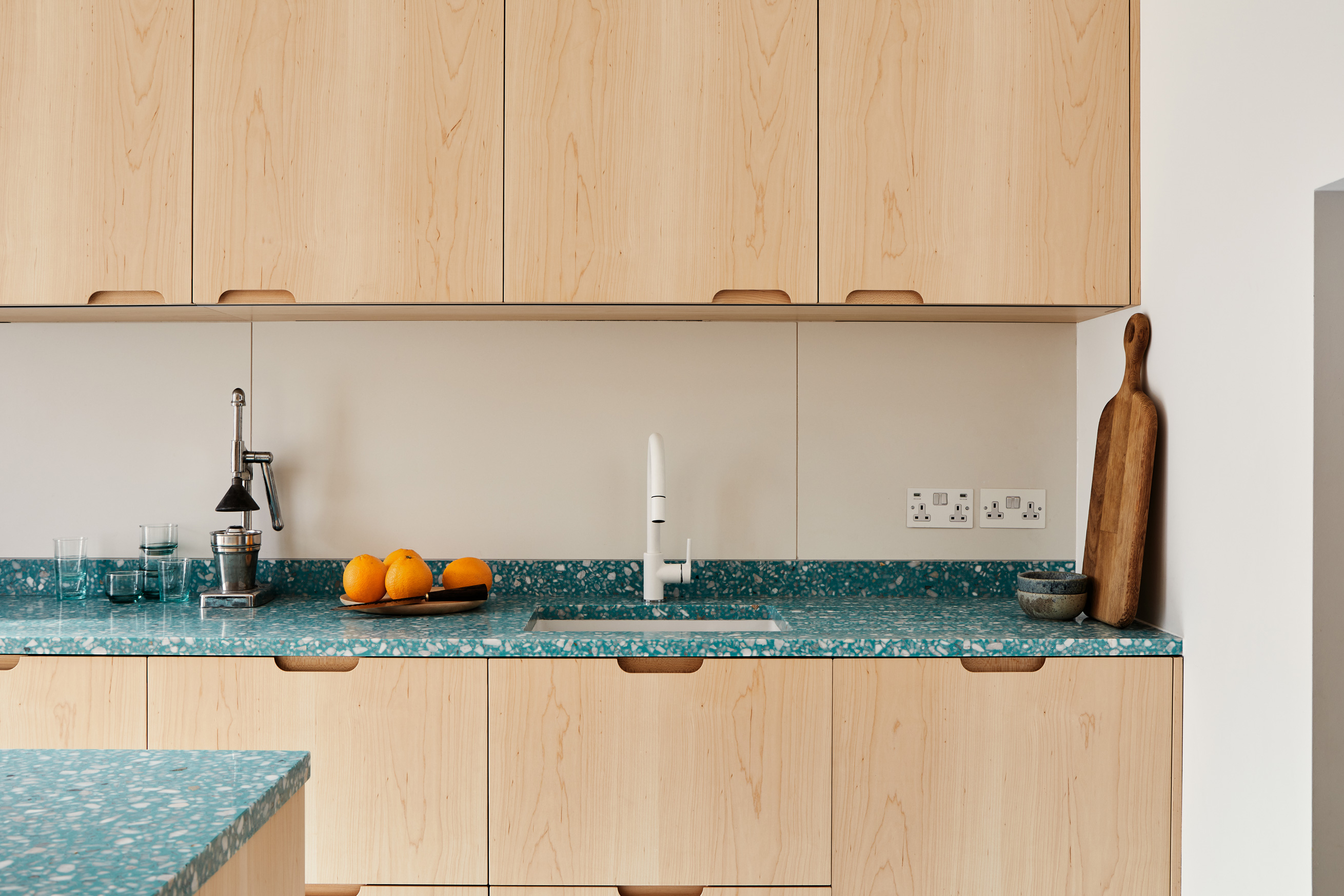wood fronts with green counter top