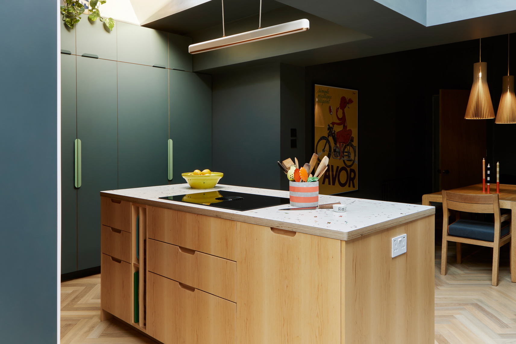 green orange and wood kitchen with kitchen island